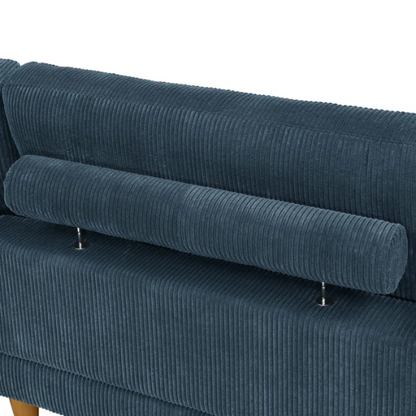 Deep teal modular sectional sofa with plush corduroy fabric, removable cushions, and a matching ottoman — seats six in flexible L- or U-shaped configurations.

