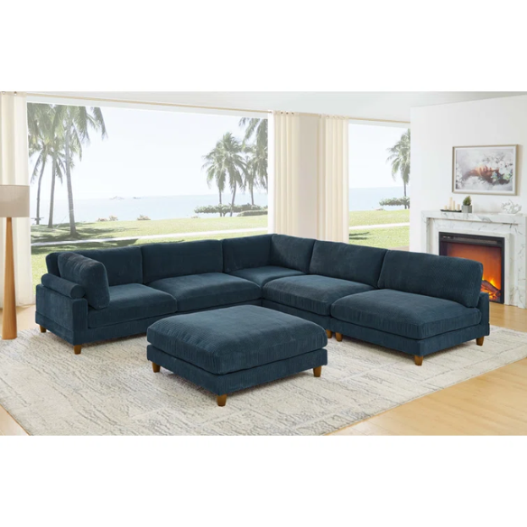 Deep teal modular sectional sofa with plush corduroy fabric, removable cushions, and a matching ottoman — seats six in flexible L- or U-shaped configurations.


