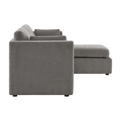 Grey four-piece modular sofa set with wide seats, soft chenille upholstery, removable cushions, and a storage ottoman — ideal for modern, versatile living spaces.

