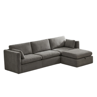 Grey four-piece modular sofa set with wide seats, soft chenille upholstery, removable cushions, and a storage ottoman — ideal for modern, versatile living spaces.

