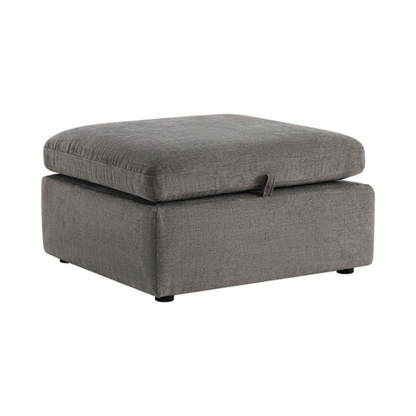 Grey four-piece modular sofa set with wide seats, soft chenille upholstery, removable cushions, and a storage ottoman — ideal for modern, versatile living spaces.

