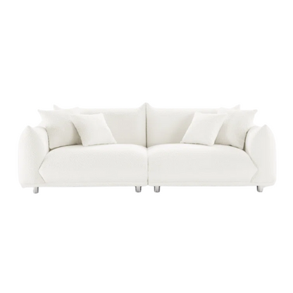 88.9-inch cream white upholstered sofa with chrome legs, deep seating, rounded arms, and four matching accent pillows, ideal for modern or minimalist interiors.

