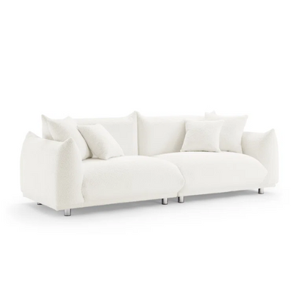 88.9-inch cream white upholstered sofa with chrome legs, deep seating, rounded arms, and four matching accent pillows, ideal for modern or minimalist interiors.

