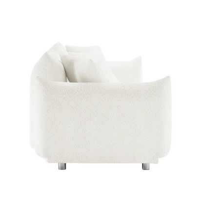 88.9-inch cream white upholstered sofa with chrome legs, deep seating, rounded arms, and four matching accent pillows, ideal for modern or minimalist interiors.

