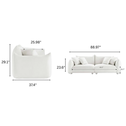 88.9-inch cream white upholstered sofa with chrome legs, deep seating, rounded arms, and four matching accent pillows, ideal for modern or minimalist interiors.


