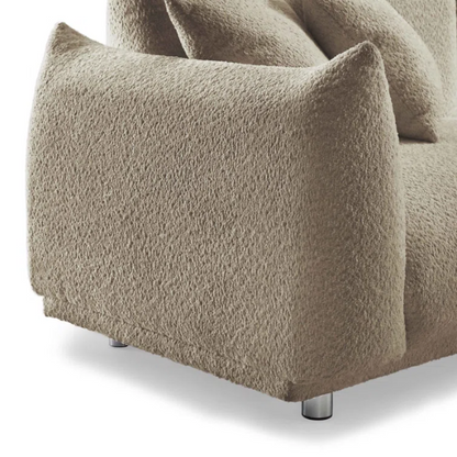 88.9-inch taupe upholstered modern sofa with chrome legs, deep seating, rounded arms, and four matching accent pillows, ideal for contemporary living rooms or home offices.

