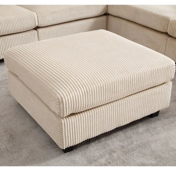 Modular beige corduroy sectional sofa with reversible L-shaped configuration, removable cushions, and soft high-density foam seating — ideal for modern or classic interiors.

