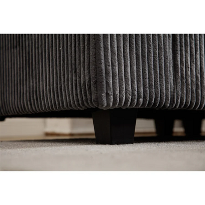 Modular grey corduroy sectional sofa with reversible L-shaped configuration, soft removable cushions, and high-density foam seating — perfect for modern living rooms.

