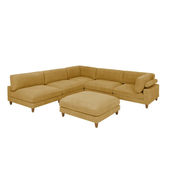 Modular mustard yellow corduroy sectional sofa with removable cushions, deep seating, and a matching ottoman — ideal for bold, spacious living room layouts.

