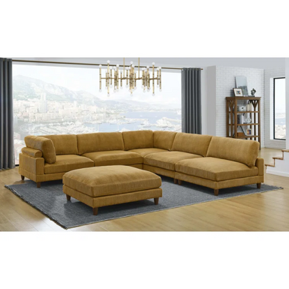Modular mustard yellow corduroy sectional sofa with removable cushions, deep seating, and a matching ottoman — ideal for bold, spacious living room layouts.

