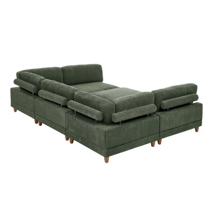 Olive drab green modular sectional sofa with soft corduroy upholstery, removable cushions, and matching ottoman — seats six with L-shaped or U-shaped layout options.

