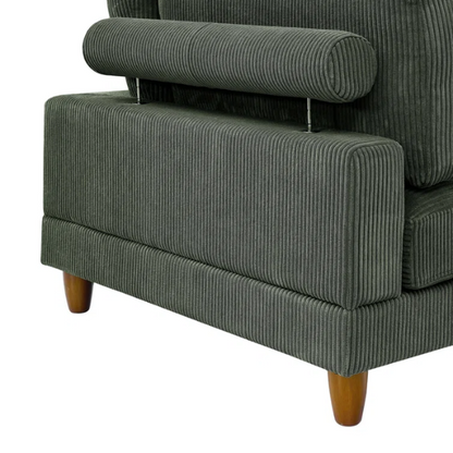 Olive drab green modular sectional sofa with soft corduroy upholstery, removable cushions, and matching ottoman — seats six with L-shaped or U-shaped layout options.

