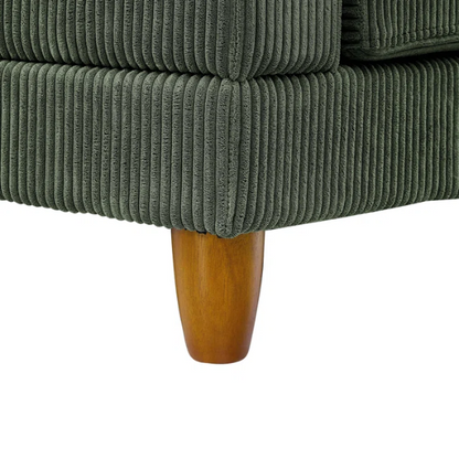 Olive drab green modular sectional sofa with soft corduroy upholstery, removable cushions, and matching ottoman — seats six with L-shaped or U-shaped layout options.

