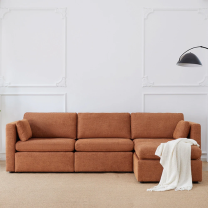 Terracotta modular four-piece sofa set with wide seats, soft chenille upholstery, removable cushions, and a gas-lift storage ottoman — perfect for modern, cozy living rooms.

