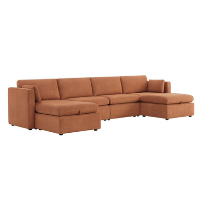 Terracotta six-piece modular sofa set featuring wide chenille-upholstered seats, two gas-lift storage ottomans, and reversible cushions — a bold, earthy centerpiece for modern or eclectic interiors.


