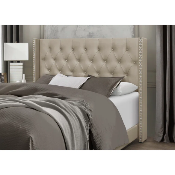 Gold faux leather full size bed with button-tufted wingback headboard, nailhead trim, and low-profile frame design.