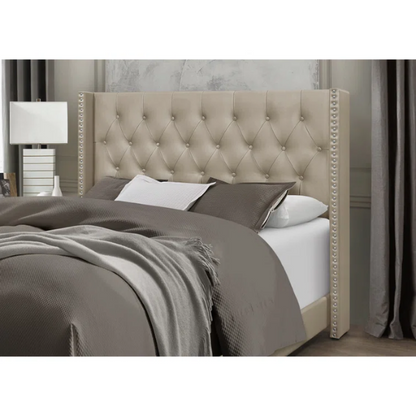 Gold faux leather full size bed with button-tufted wingback headboard, nailhead trim, and low-profile frame design.