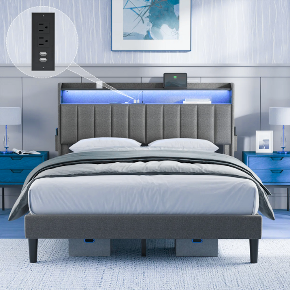 Gray full-size upholstered platform bed with LED headboard, hidden storage compartments, and built-in USB and AC outlets
