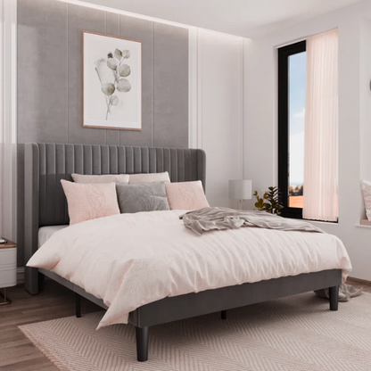 "Gray full-size velvet upholstered platform bed with tufted wingback headboard and solid wood slats