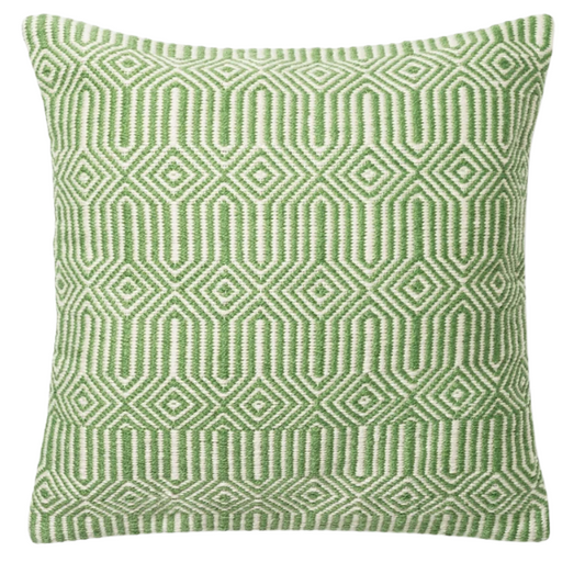 Green and cream geometric throw pillow on outdoor seating with modern patio decor

