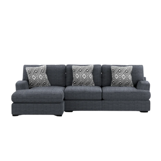 Modern grey chenille sectional sofa with chaise lounge, geometric accent pillows, and track arms in a contemporary living room setting.