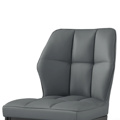 Grey faux leather dining chairs with checkered backrest and metal legs in a set of two