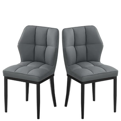 Grey faux leather dining chairs with checkered backrest and metal legs in a set of two