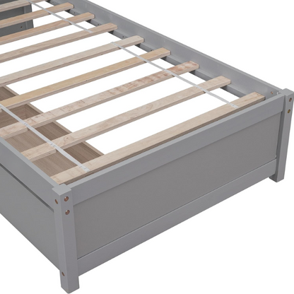 Grey twin platform bed with two underbed storage drawers, made from solid wood with a modern low-profile design—perfect for kids, teens, or guest rooms.

