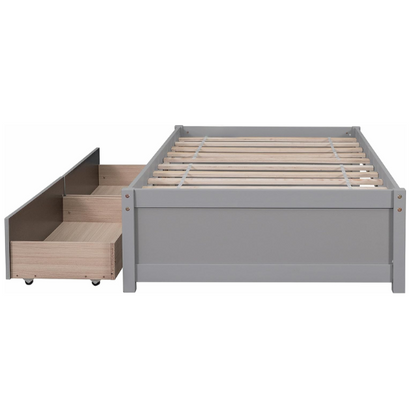 Grey twin platform bed with two underbed storage drawers, made from solid wood with a modern low-profile design—perfect for kids, teens, or guest rooms.

