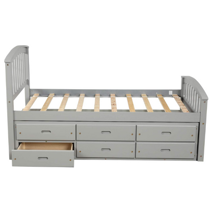 Grey twin bed frame made from solid pine wood with underbed storage drawers, finished in non-toxic paint with a slatted base, ideal for children or teens in a modern bedroom.

