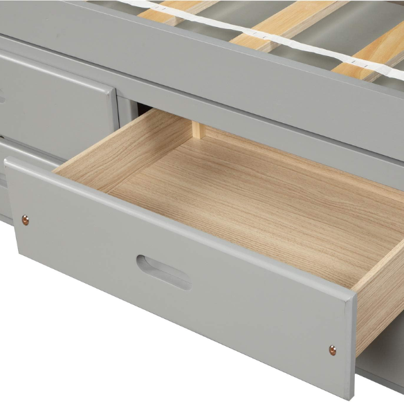 Grey twin bed frame made from solid pine wood with underbed storage drawers, finished in non-toxic paint with a slatted base, ideal for children or teens in a modern bedroom.

