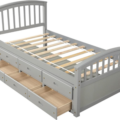 Grey twin bed frame made from solid pine wood with underbed storage drawers, finished in non-toxic paint with a slatted base, ideal for children or teens in a modern bedroom.

