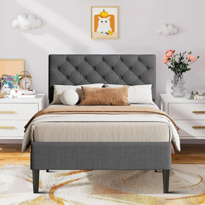 Grey twin upholstered bed frame with button-tufted adjustable headboard, wooden slats, and soft linen fabric for kids or guest rooms.

