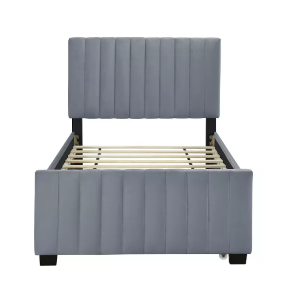 Grey twin upholstered platform bed with tufted velvet headboard and pull-out trundle, ideal for kids, teens, or guest rooms, featuring a soft grey finish and space-saving design.

