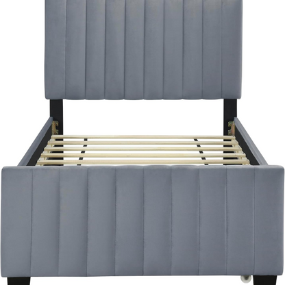 Grey twin upholstered platform bed with tufted velvet headboard and pull-out trundle, ideal for kids, teens, or guest rooms, featuring a soft grey finish and space-saving design.

