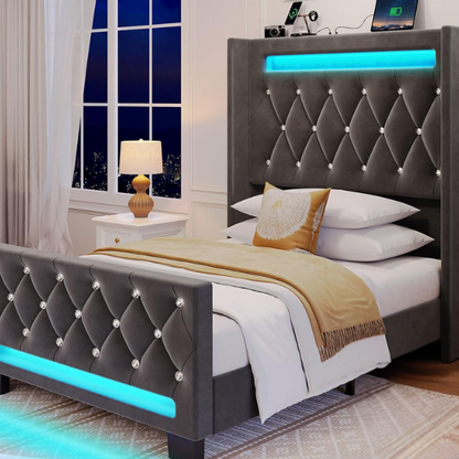 Modern grey twin bed with LED lights, USB charging ports, and upholstered velvet headboard and footboard – no box spring required