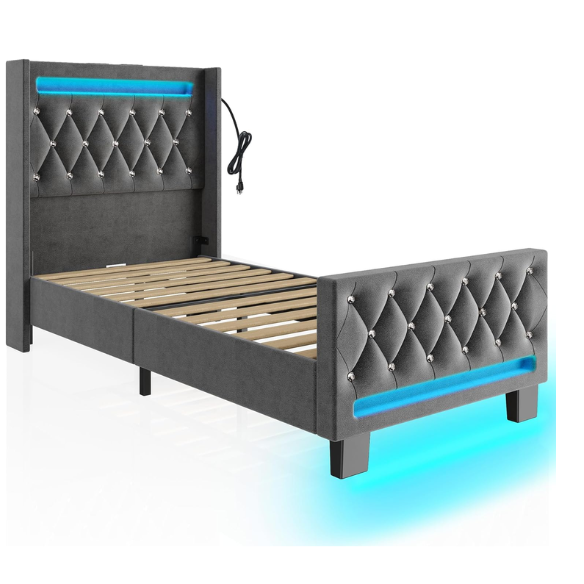 Modern grey twin bed with LED lights, USB charging ports, and upholstered velvet headboard and footboard – no box spring required