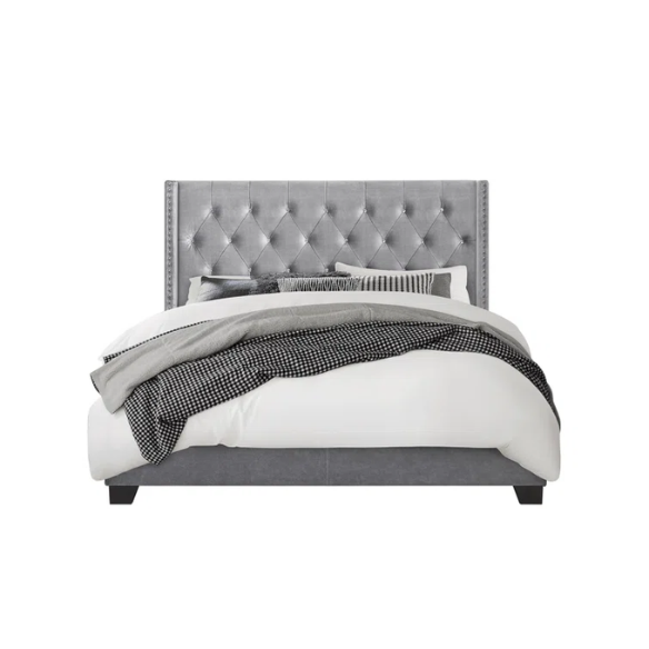 Grey velvet full size upholstered bed with button-tufted wingback headboard, nailhead trim, and solid wood frame