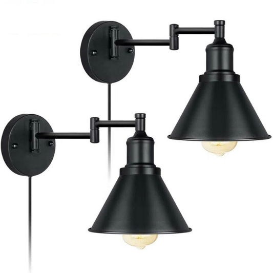 Industrial matte black swing arm wall sconce with adjustable arm and E26 bulb socket, perfect for vintage-inspired interiors.