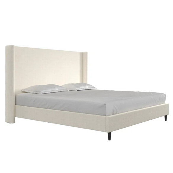 Ivory bouclé upholstered king-size platform bed with tall wingback headboard, wood slats, and no box spring required.

