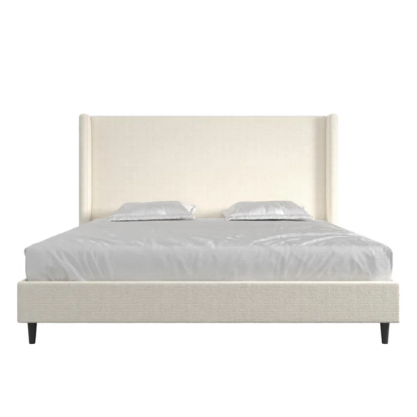 Ivory bouclé upholstered king-size platform bed with tall wingback headboard, wood slats, and no box spring required.

