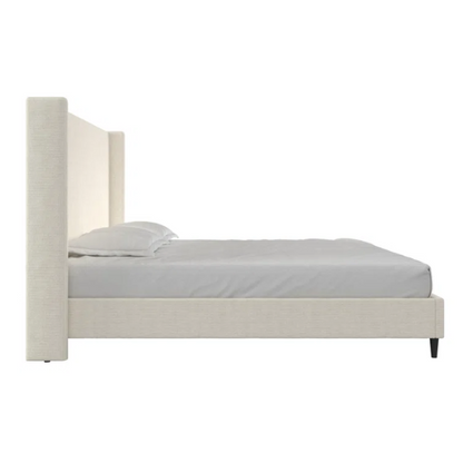 Ivory bouclé upholstered king-size platform bed with tall wingback headboard, wood slats, and no box spring required.

