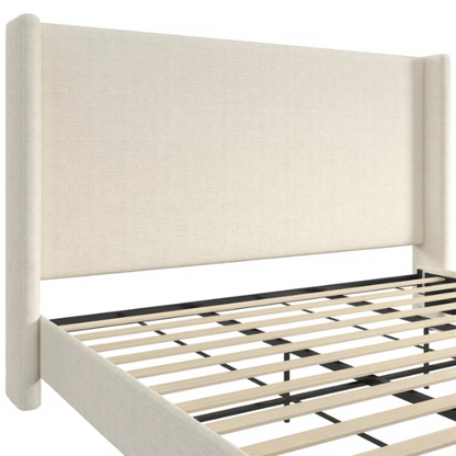 Ivory bouclé upholstered king-size platform bed with tall wingback headboard, wood slats, and no box spring required.

