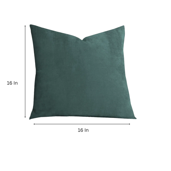 Juniper green crushed velvet throw pillow, 16x16 square with soft, reversible fabric and hidden zipper, styled on a cozy sofa for a sophisticated touch.

