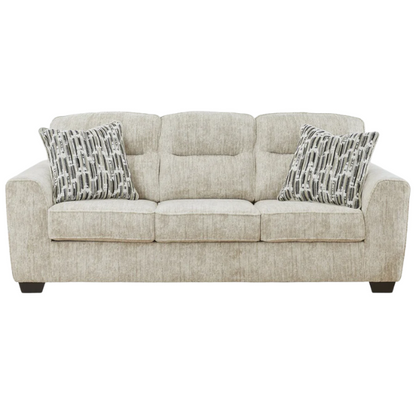Light beige 3-seater sofa with plush cushions, accent pillows, and dark tri-block legs, ideal for modern living rooms.

