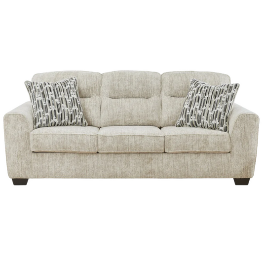 Light beige 3-seater sofa with plush cushions, accent pillows, and dark tri-block legs, ideal for modern living rooms.

