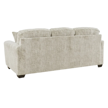 Light beige 3-seater sofa with plush cushions, accent pillows, and dark tri-block legs, ideal for modern living rooms.

