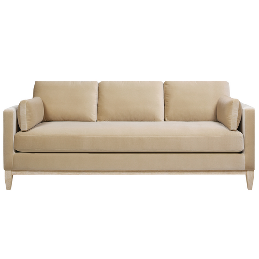 Light camel velvet 3-seater sofa with feather-down cushions, track arms, and solid wood legs, ideal for modern and transitional spaces.

