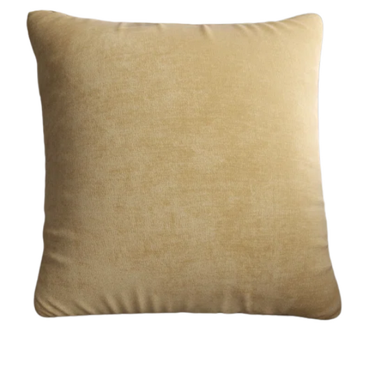 Light gold crushed velvet throw pillow, 16x16 square with soft texture and reversible design, styled in a neutral living space for a touch of subtle shine.

