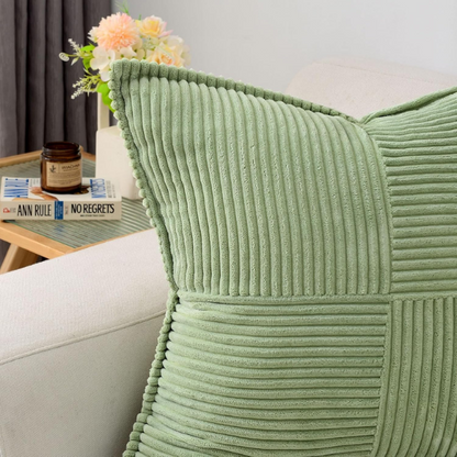 Light green corduroy pillow cover with geometric striped pattern, modern and eco-friendly, ideal for sofas, chairs, and outdoor patios.